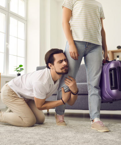 Anxious man clinging to significant other